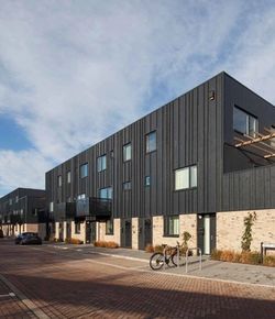 Apartments with black timber and brick cladding