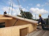SIPS roof panel installation on site