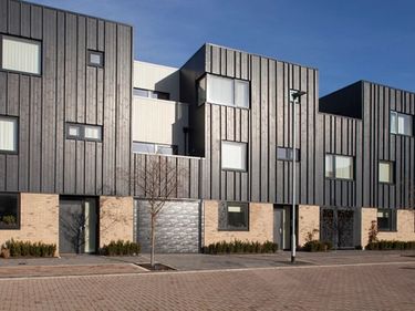 Townhouses built using structurally insulated panels