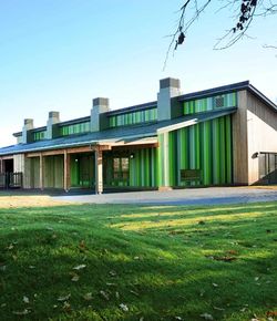Timber frame nursery building with colourful cladding
