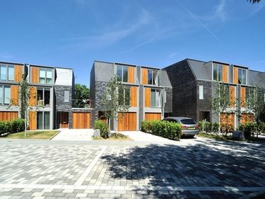 Row of thermally efficient housing