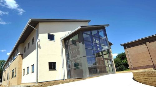 timber frame school building with large glazed entrance hall