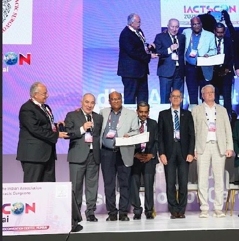 Dr. Parikh receiving the award