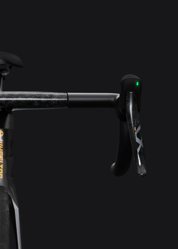 WHEELTOP EDS TX dual-control shifter on a road bike handlebar, green status indicator light