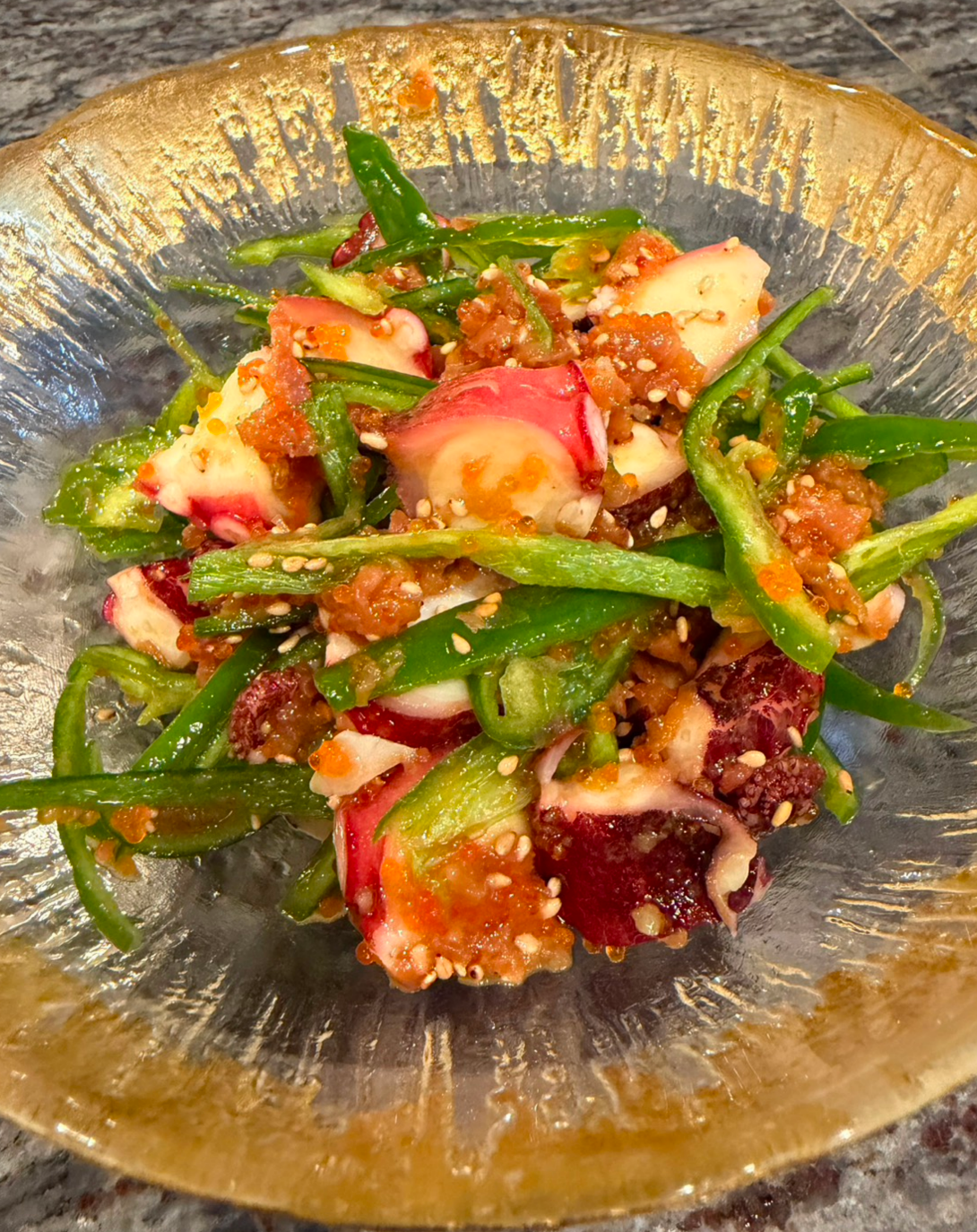 Octopus and green pepper with plum dressing