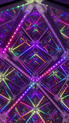View into colorful LED artwork with many self-similar internal reflections