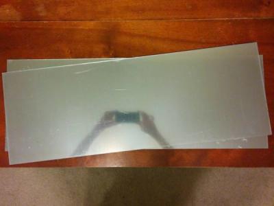 Half-mirrored (spyglass) acrylic sheets