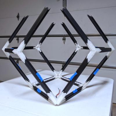 A partially assembled 3D-printed Rhombotron frame previewing the face-on perspective