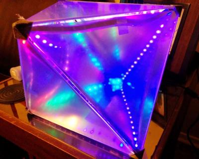 A test fitting of the glowing LED strand inside the incomplete octahedral infinity mirror