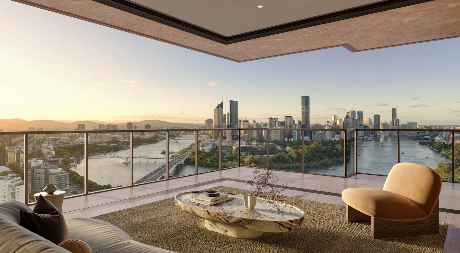 Expansive balcony at Cliff by Aria in Brisbane with panoramic views of the Brisbane River, city skyline, and mountains at sunset.