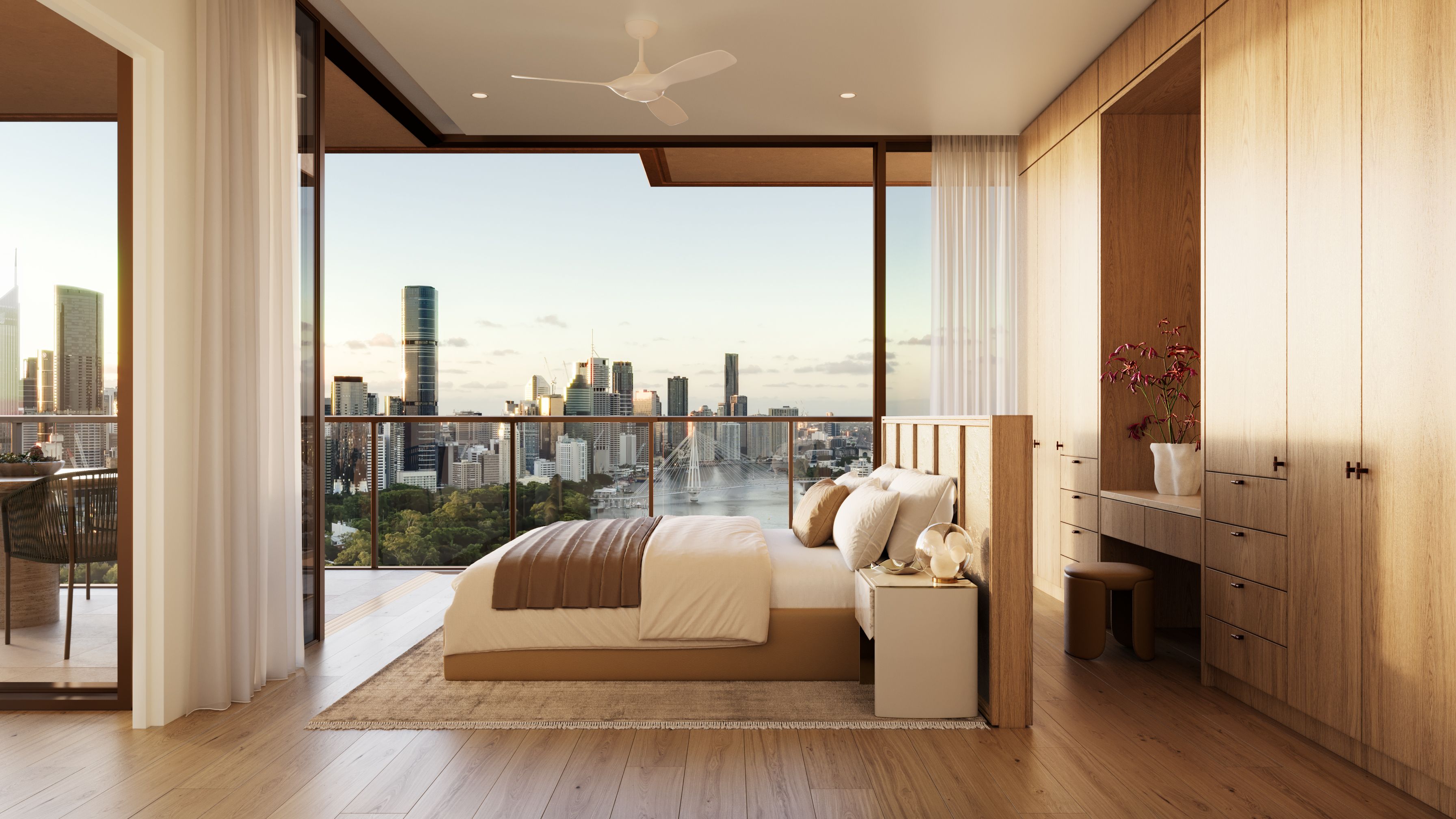 Luxury apartment master bedroom at Cliff by Aria in Brisbane with private balcony, timber finishes, and sweeping views of the Brisbane River and city skyline.