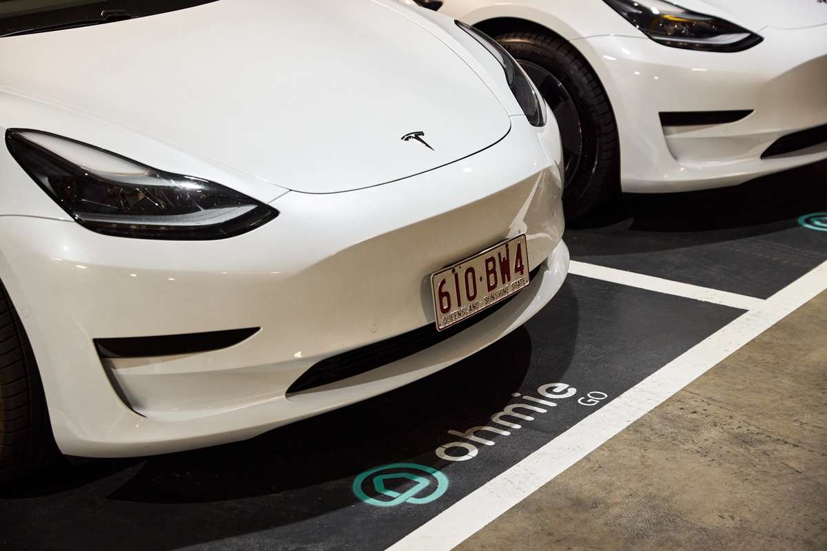 The Standard by Aria, with Tesla electric vehicle car loan service available to all residents.