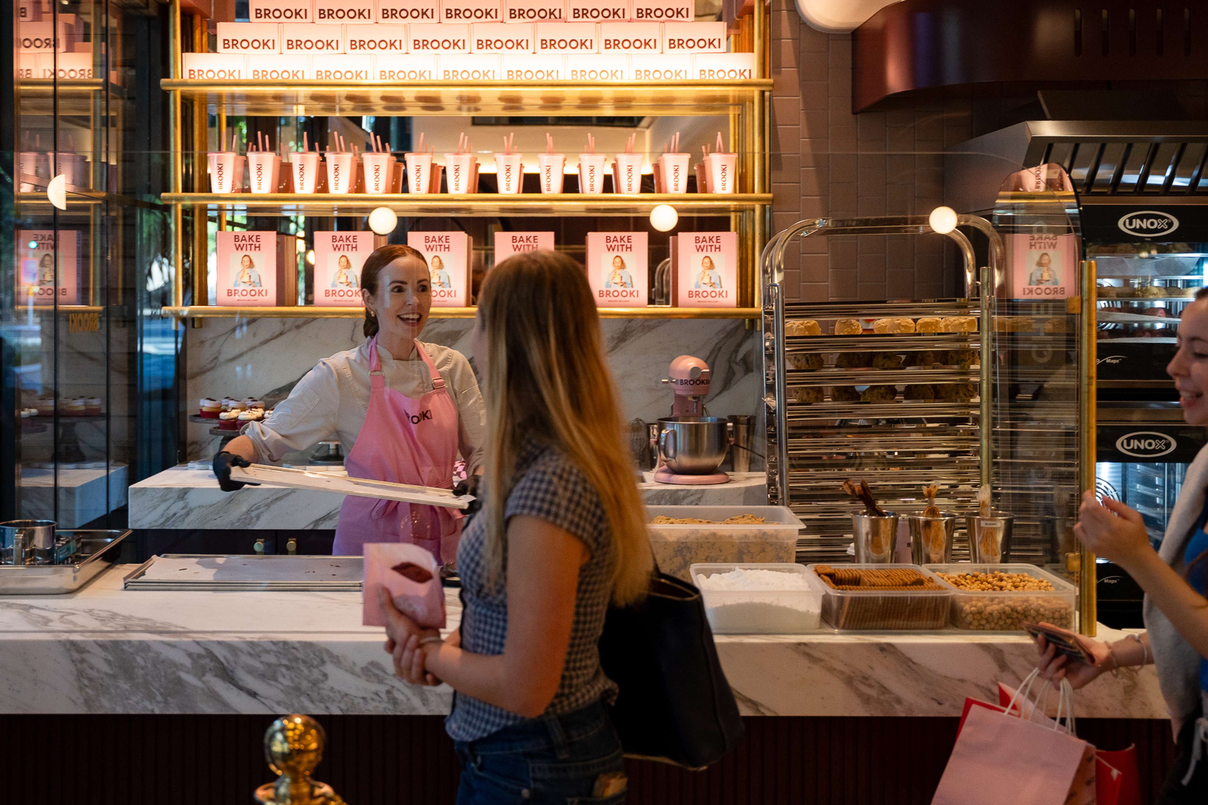 Opening day crowd at the Brooki Bakehouse counter, South Brisbane