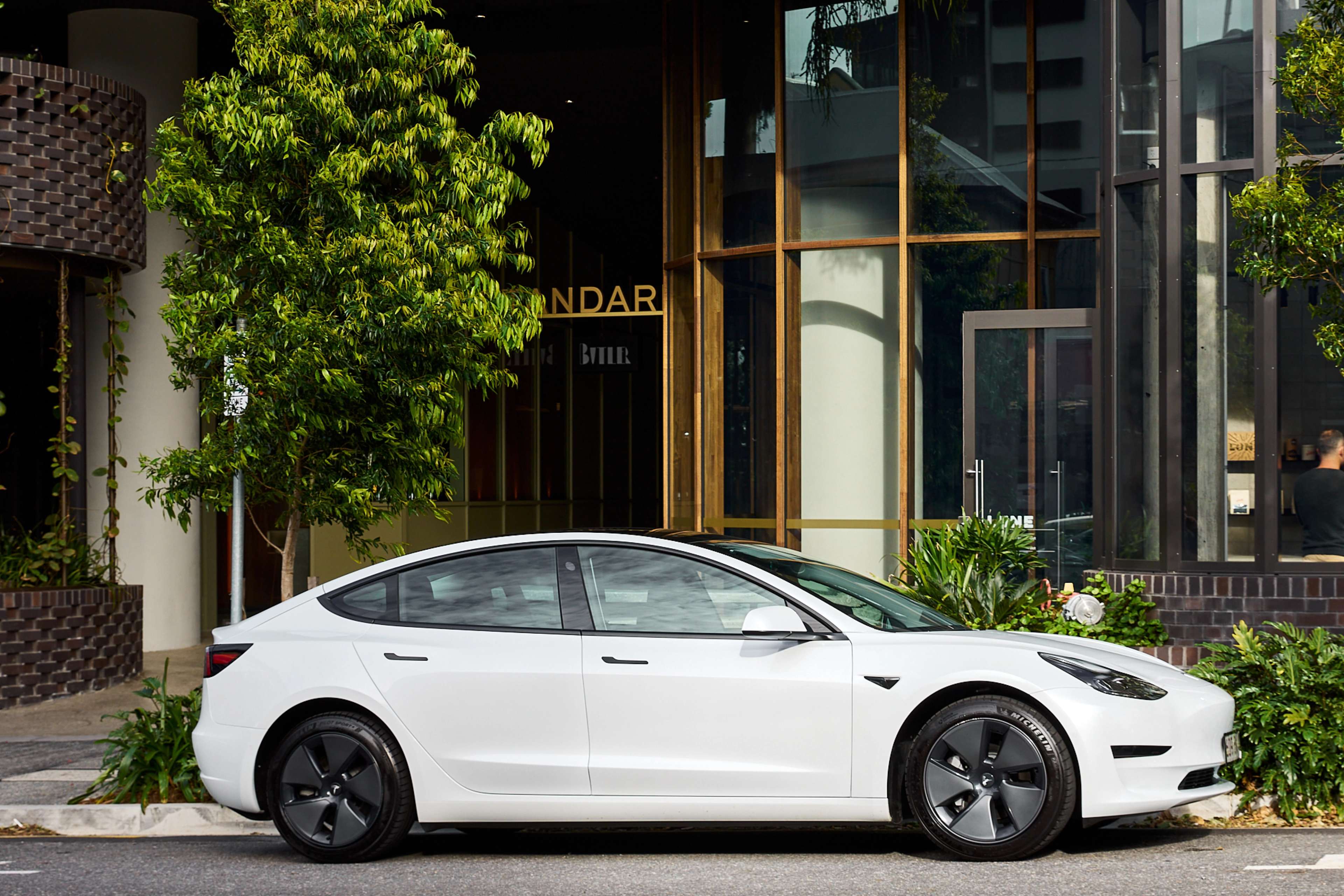 The Standard by Aria, with Tesla electric vehicle car loan service available to all residents.
