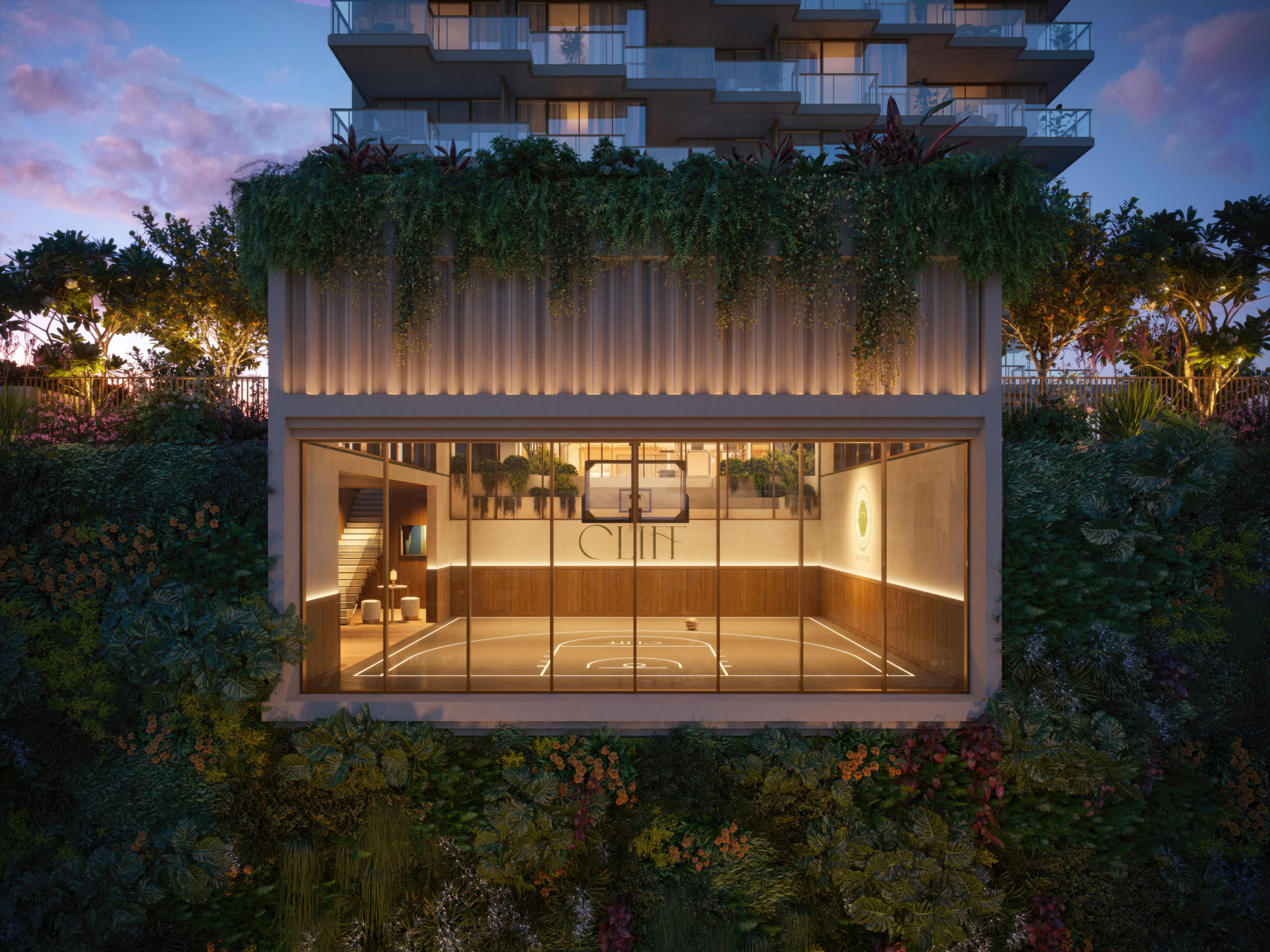 The Court at Cliff by Aria in Brisbane, an elevated, professional-grade multi-sport court eight levels above the Kangaroo Point Cliffs, featuring next-gen tech, timber finishes, and lush landscaped surrounds.
