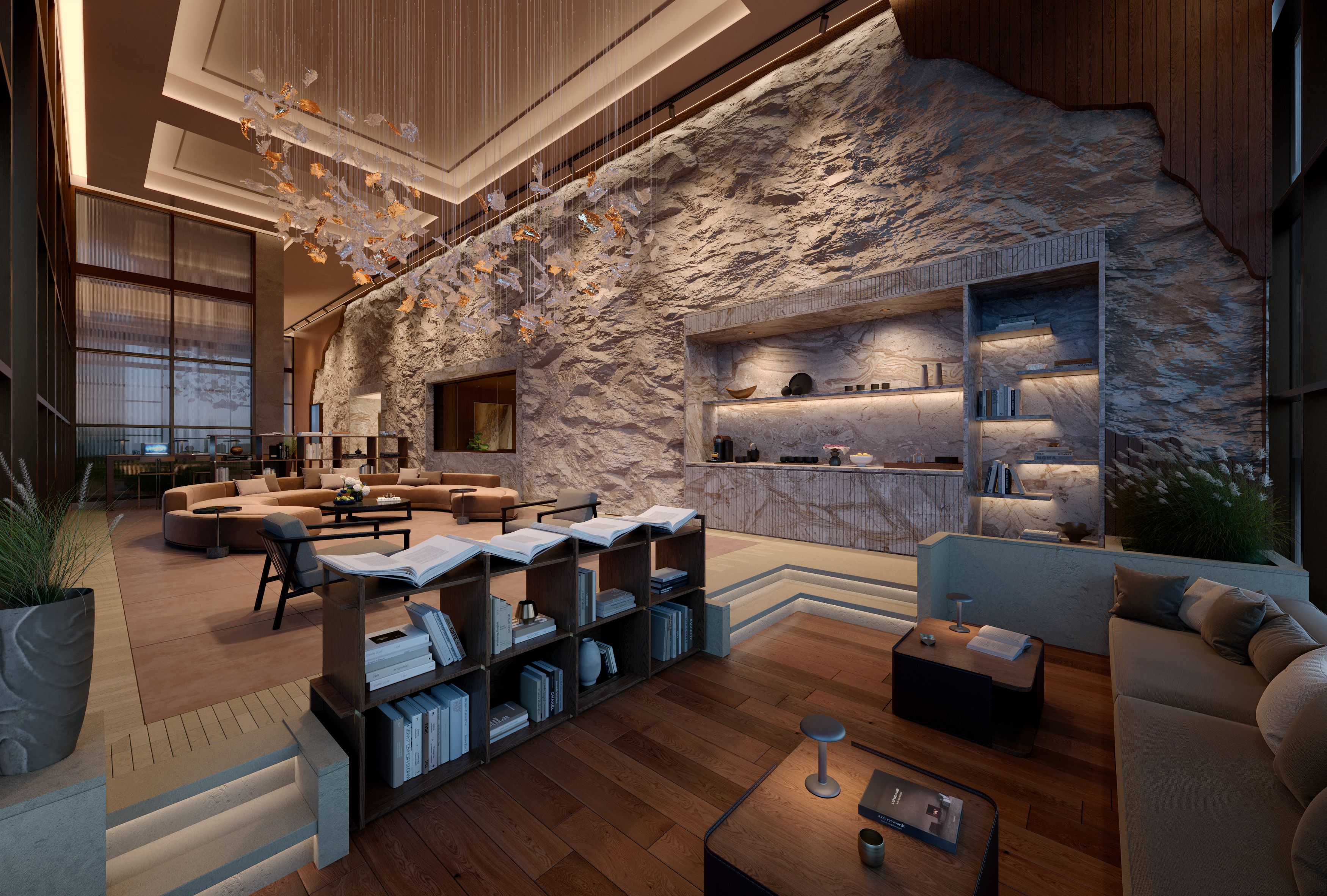 Luxury lobby at Cliff by Aria in Brisbane, featuring a dramatic natural stone feature wall, sculptural lighting installation, and sophisticated lounge seating.