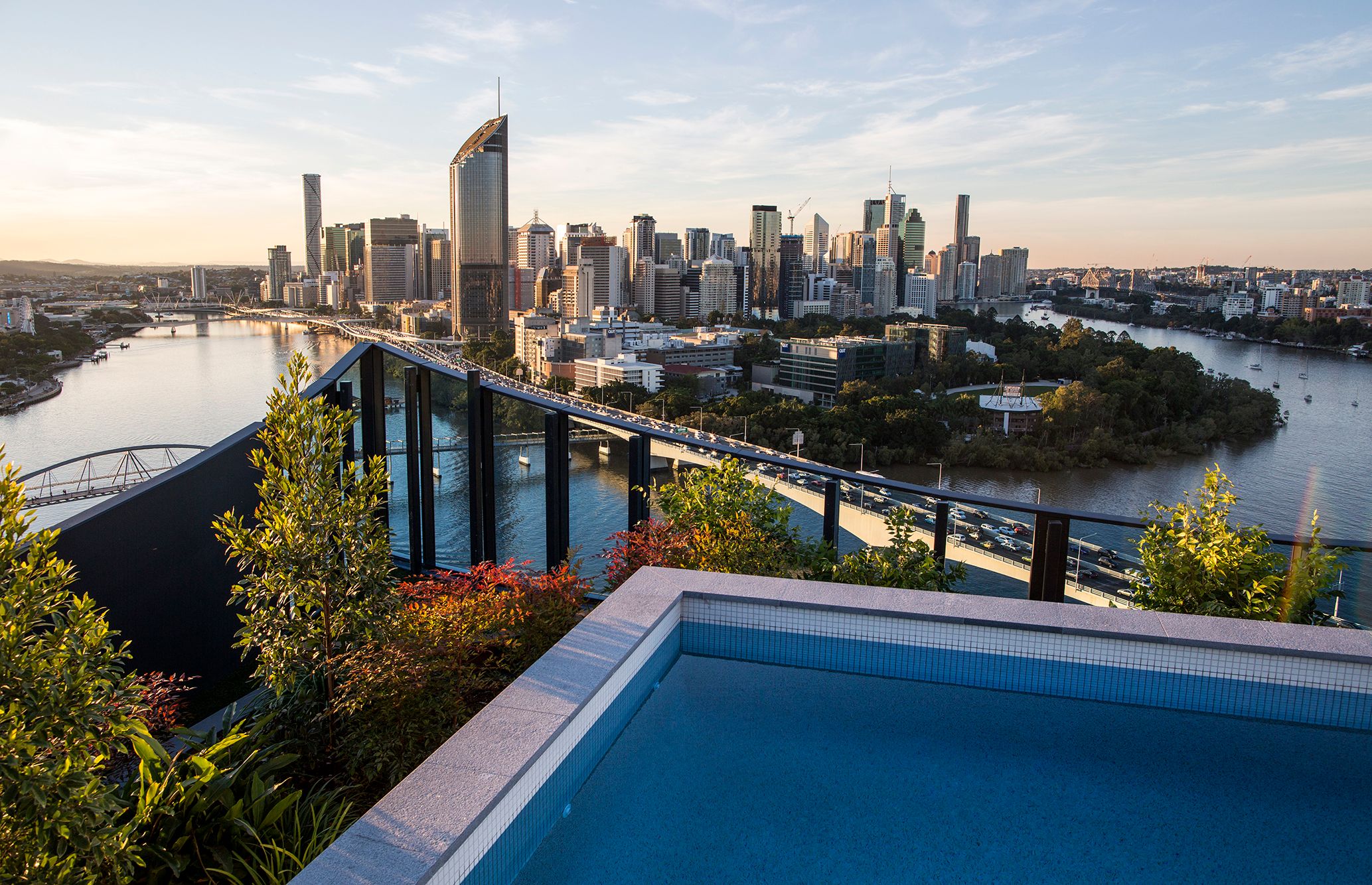St Julien by Aria, rooftop swimming pool with views of Brisbane city.