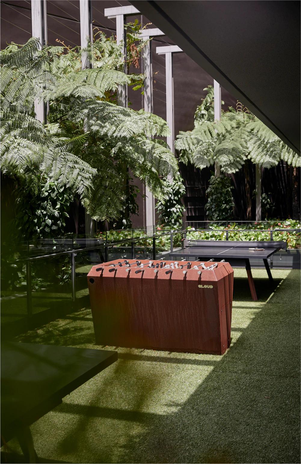 At The Drapery's podium floor, a unique residents' retreat known as the "Baby Gabba Green" entices residents to enjoy a game of table tennis, read their favourite book or just relax amongst the lush integrated landscaping.