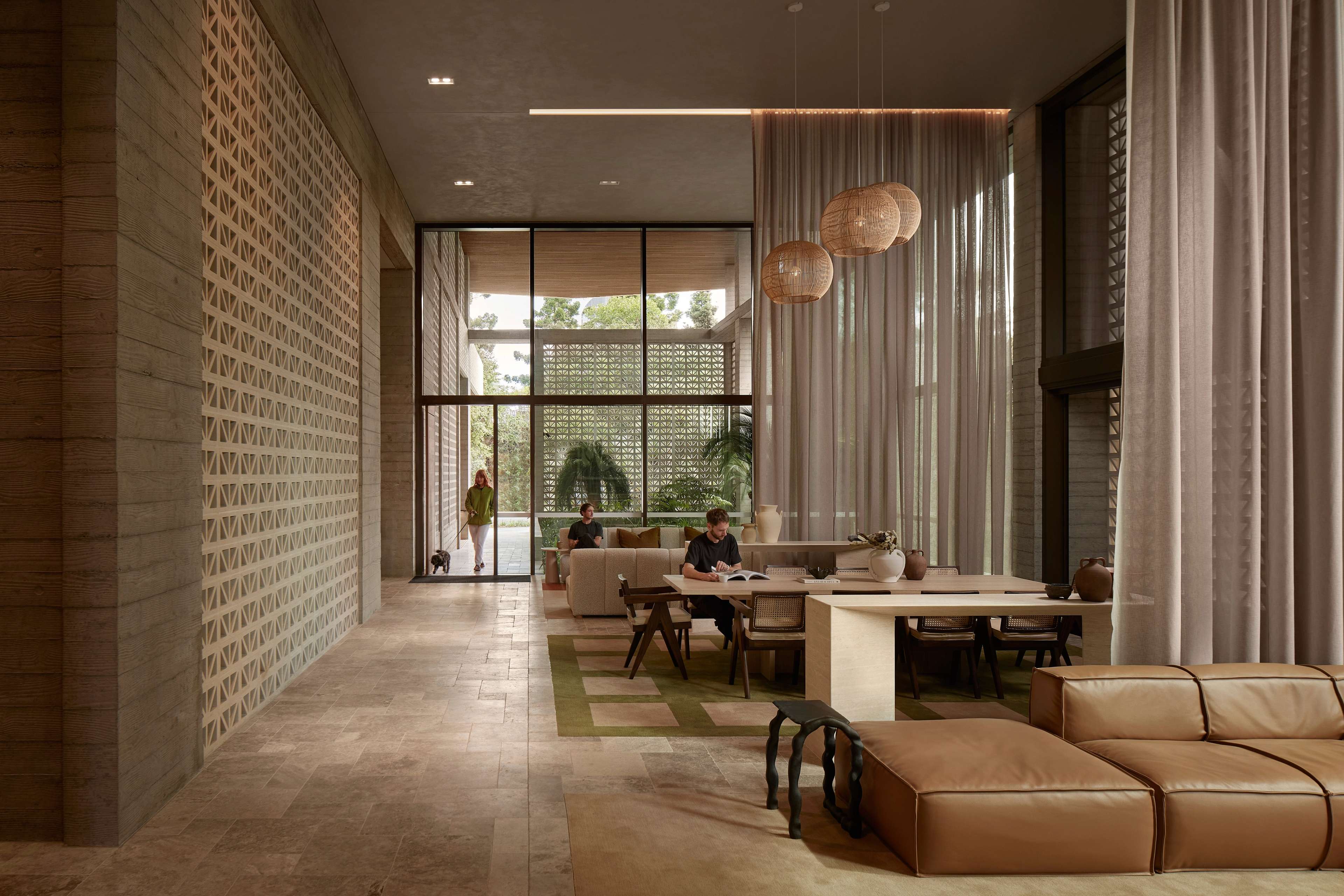 Residents' lounge with full-height glazing at Rivière by Aria