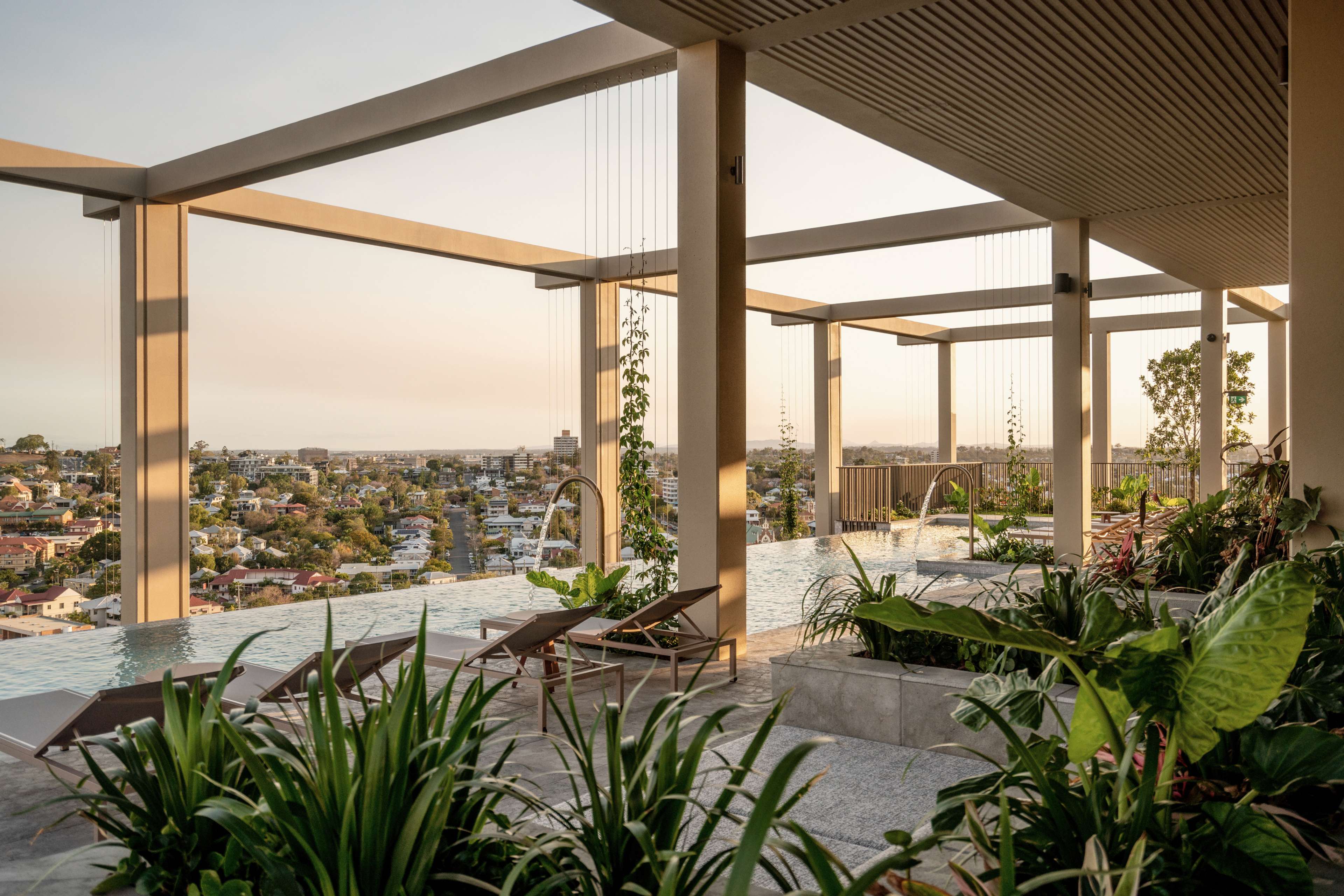 Rooftop pergola and gardens overlooking Brisbane at Trellis by Aria
