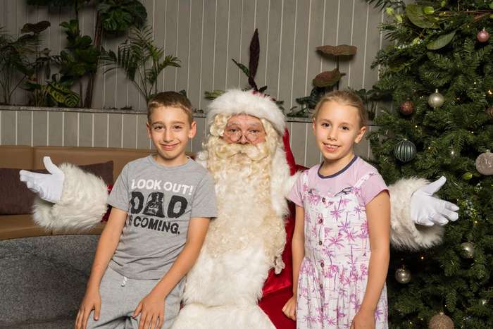 Santa Claus celebrating Christmas at TreeHouse by Aria.