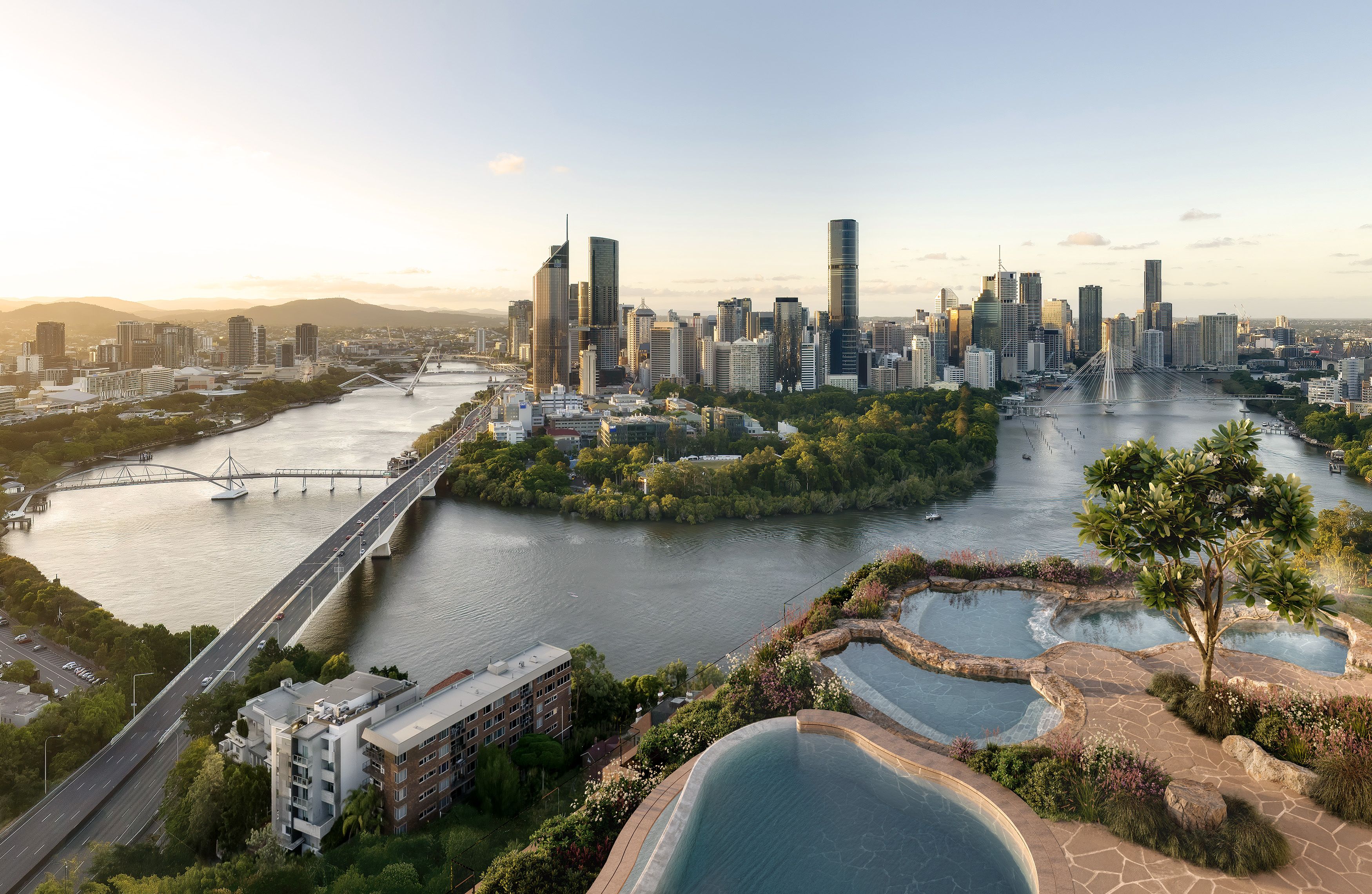 Rooftop infinity rock pools at Cliff by Aria in Brisbane with sweeping views of the Brisbane River, city skyline, and mountains at sunset.