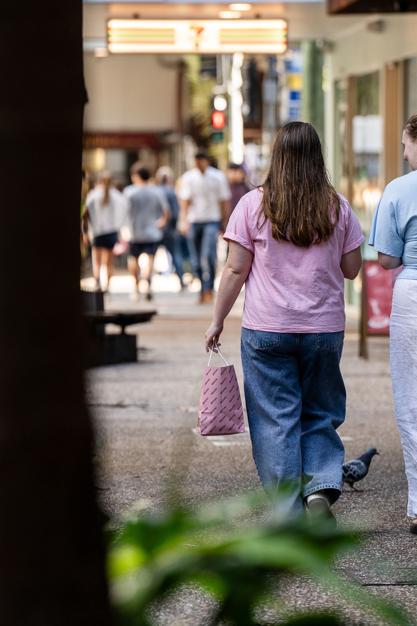 Walking along Fish Lane with a Brooki Bakehouse bag