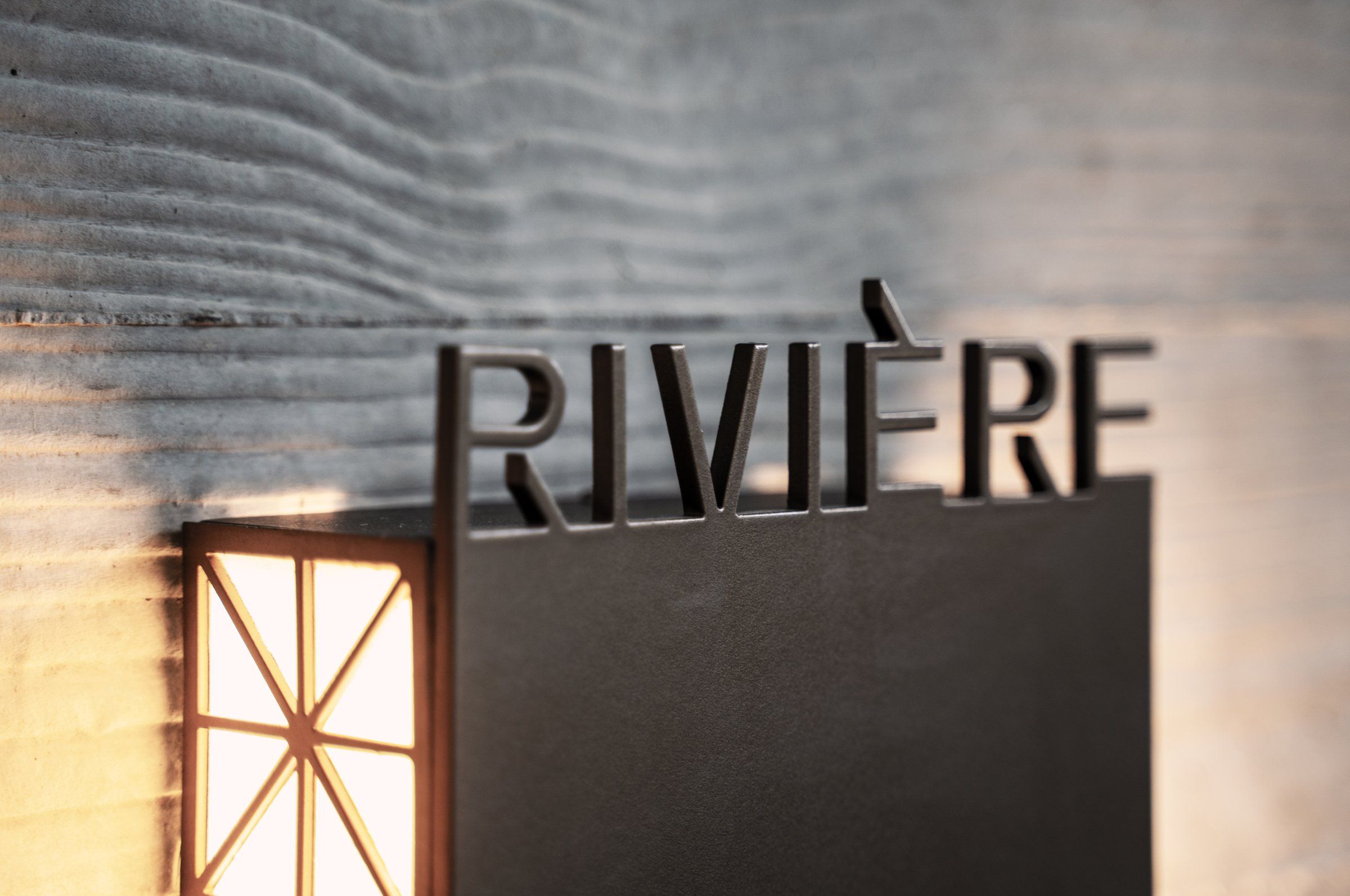 Rivière signage at the building entry, Kangaroo Point