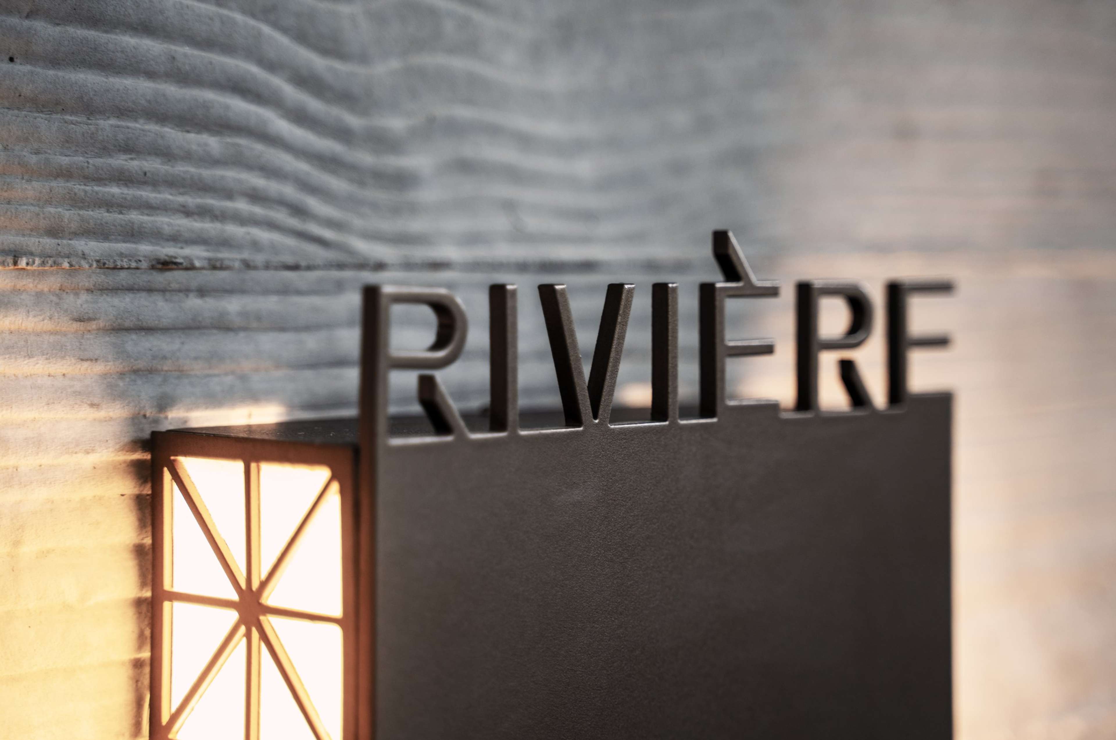 Rivière signage at Rivière by Aria, Kangaroo Point