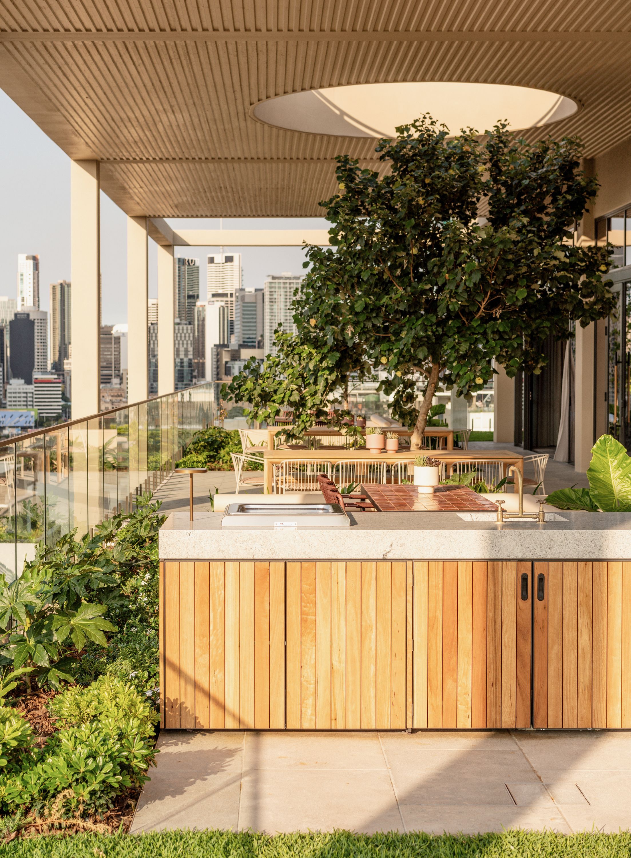 Outdoor kitchen and barbecue at the Trellis by Aria rooftop club