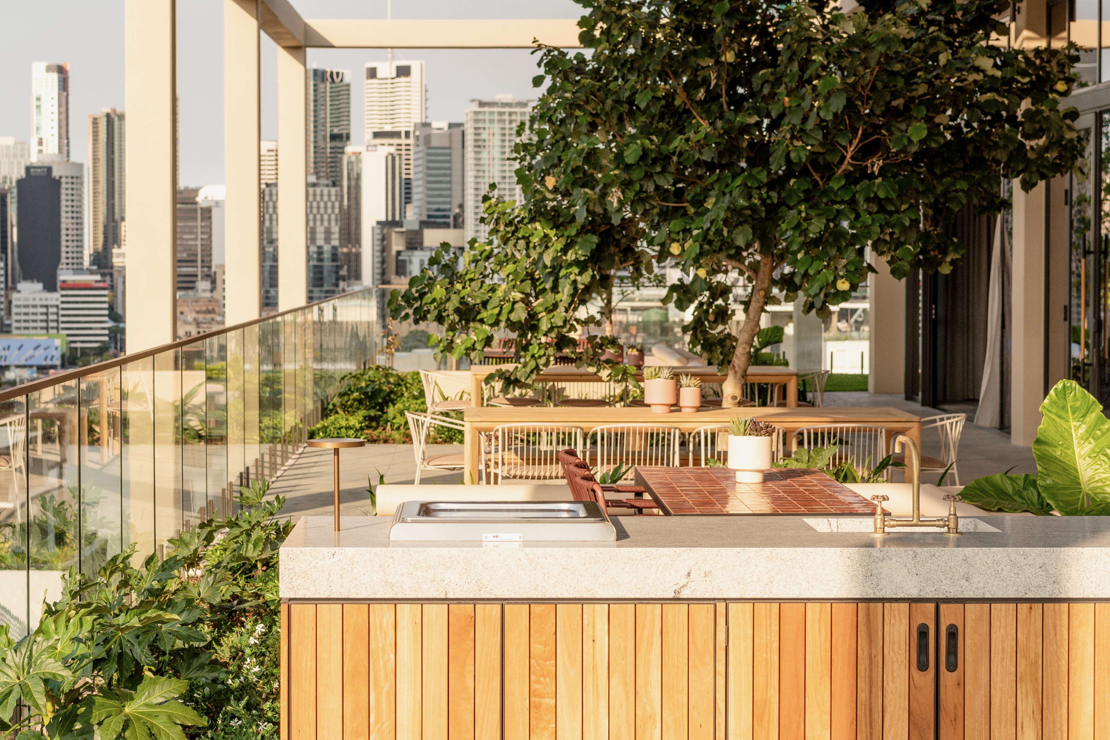 Outdoor kitchen and barbecue at the Trellis by Aria rooftop club