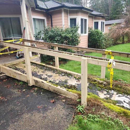 Dilapidated ramp on front porch