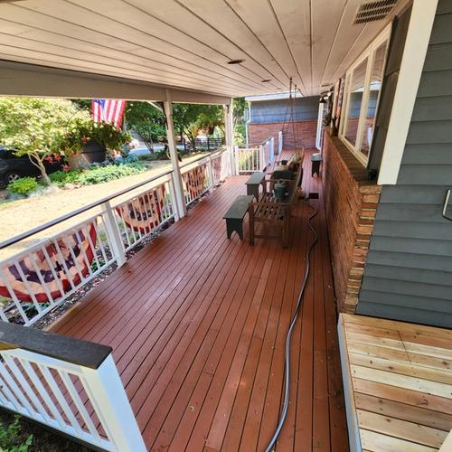 This portion of the deck was refinished entirely with salvaged, cleaned boards.