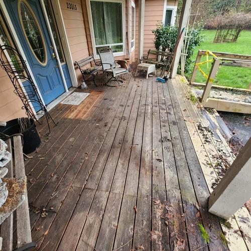 rotted front porch, nonsensical board placement