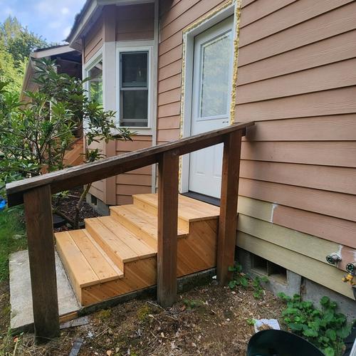 New staircase, door, and rot repair, pre-finished