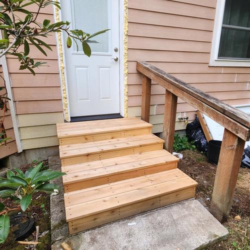 New staircase, door, and rot repair, pre-finished