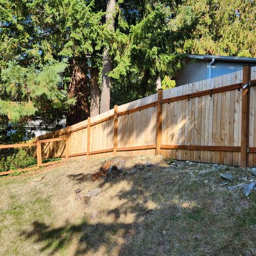 new full fence and new pony fence side by side
