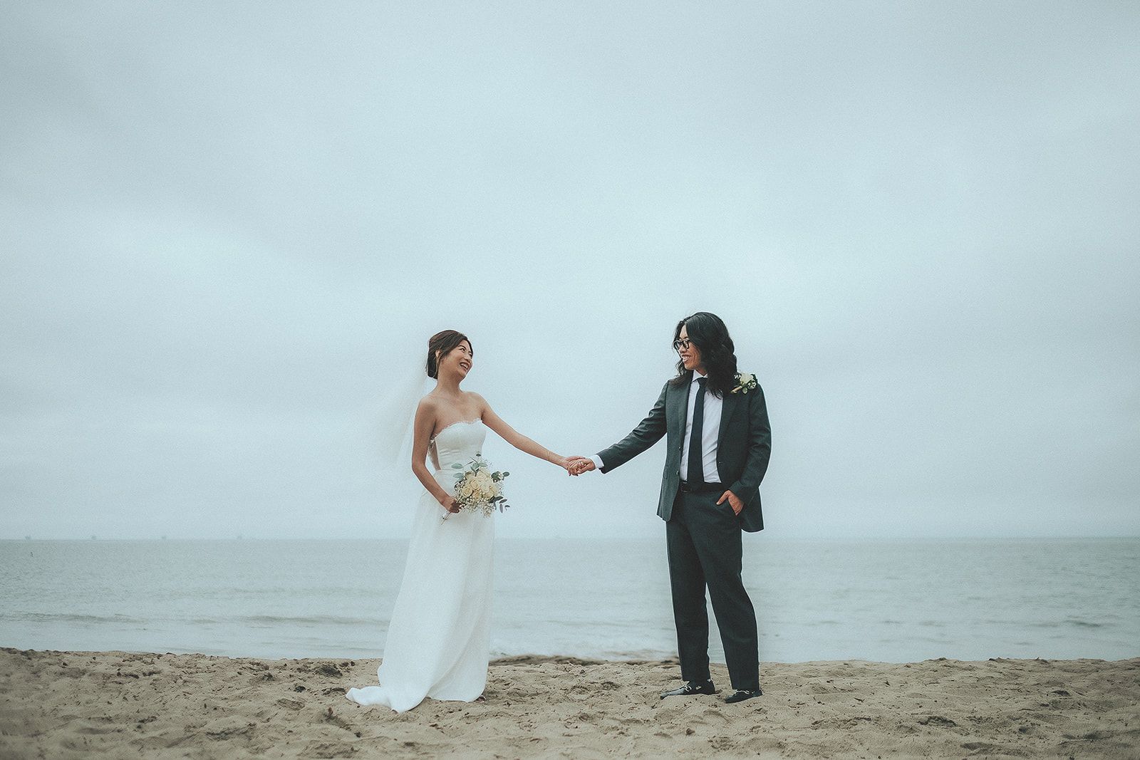 Wide newlywed portrait on the Santa Barbara coast