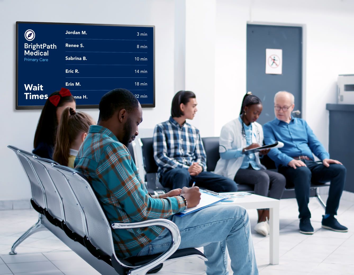 A group of people sitting and waiting for a doctor's appointment with a waitlist screen displayed behind them