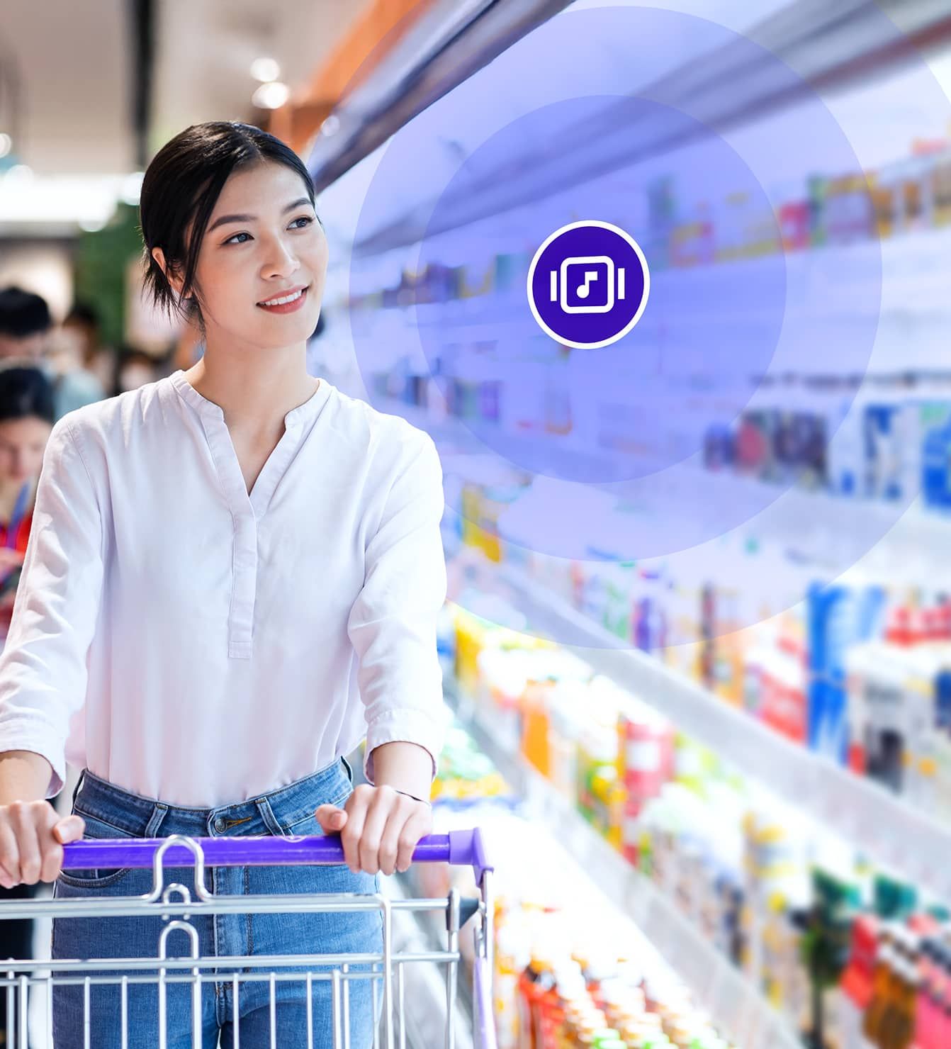 Shopper with in-store background music in grocery aisle