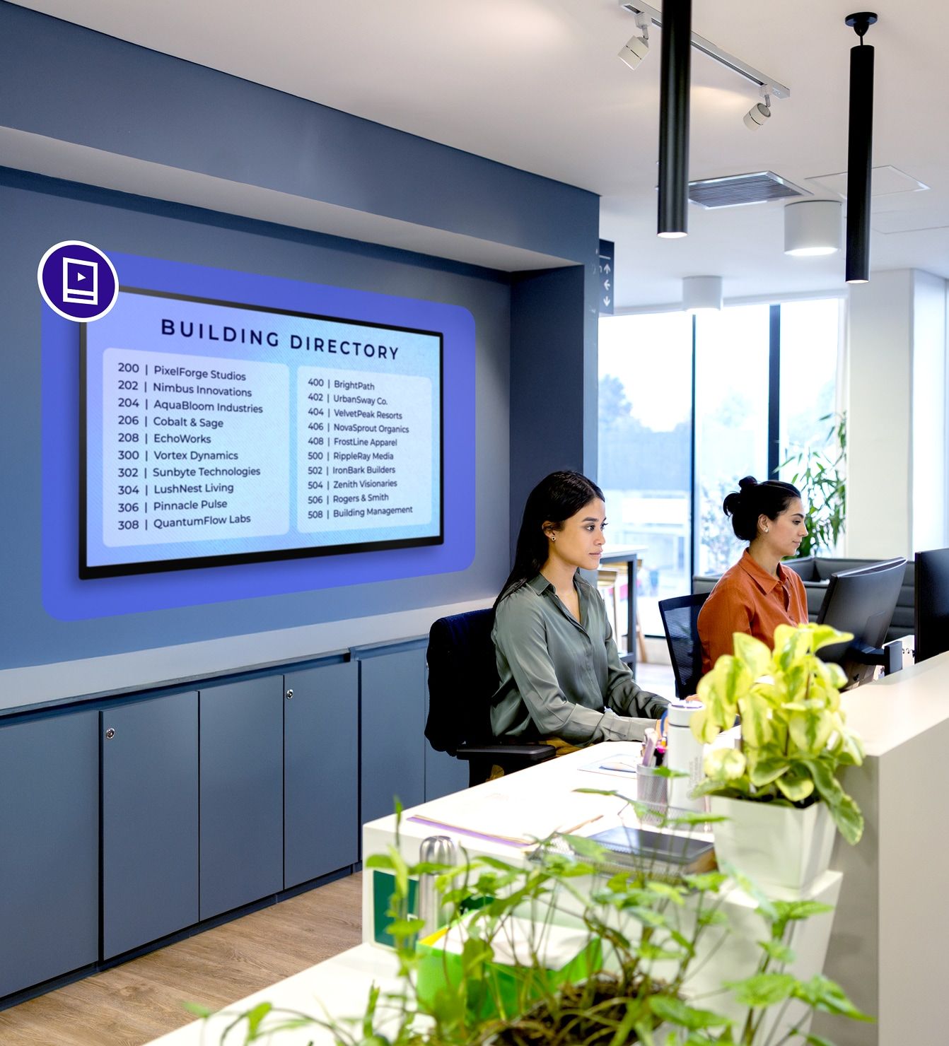 Digital building directory display at a corporate office reception desk