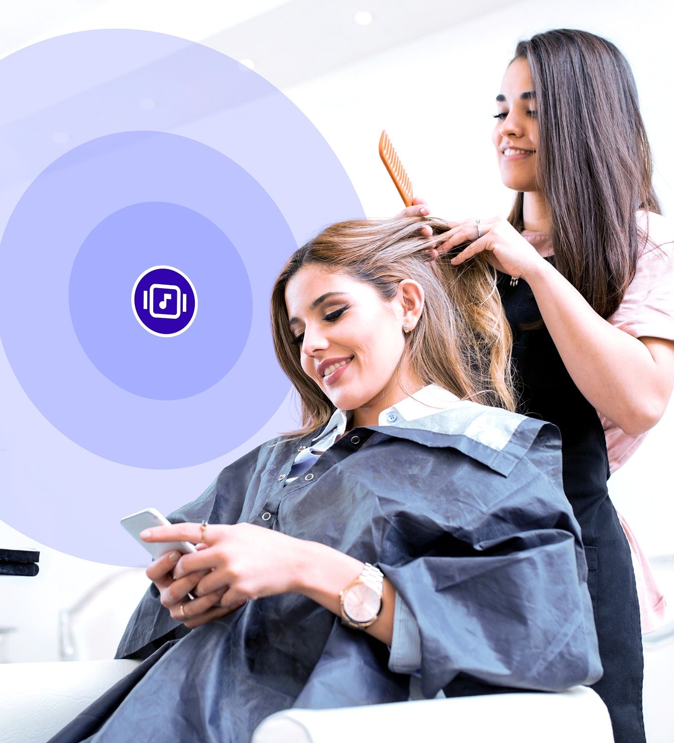 Salon guest listening to music during a styling appointment