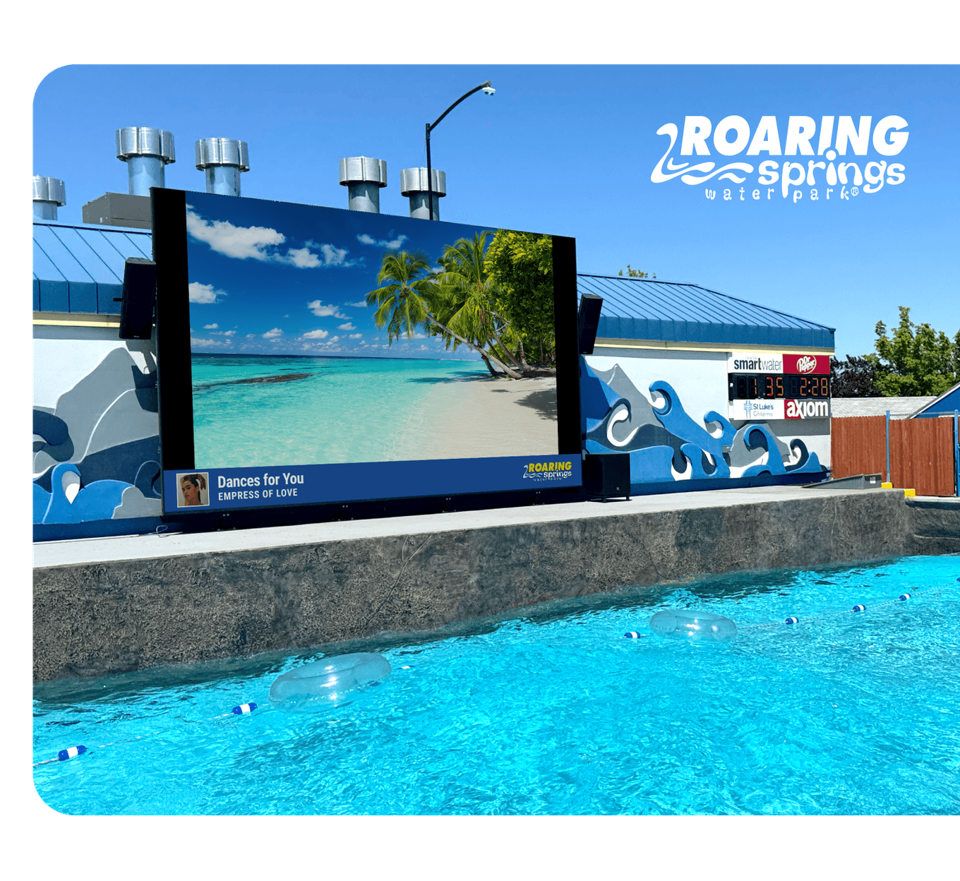 Rockbot-powered video screen at Roaring Springs Wave Pool with family-friendly content
