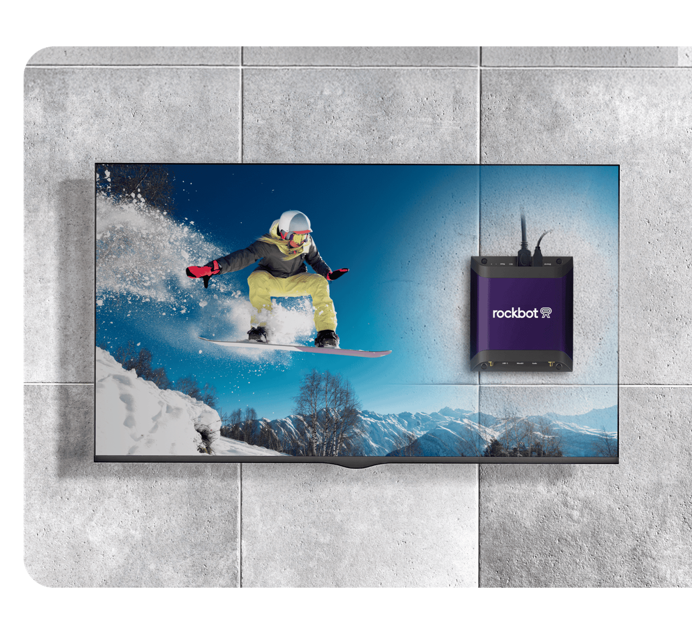 Rockbot Media Player connected to TV display, showing easy plug-and-play setup for business environments.