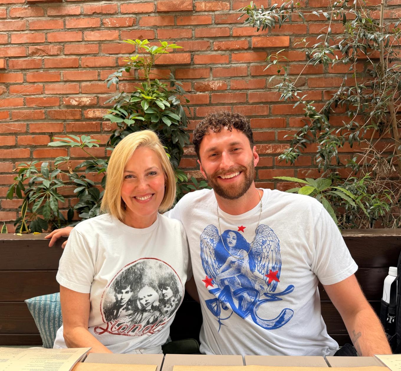 2 people hiking and posing for a selfie together