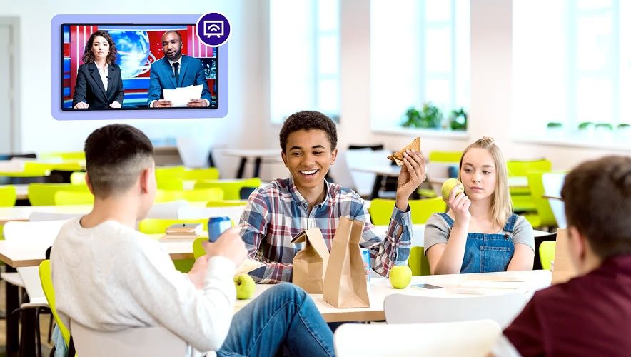 Students watching TV in a campus lounge or common area