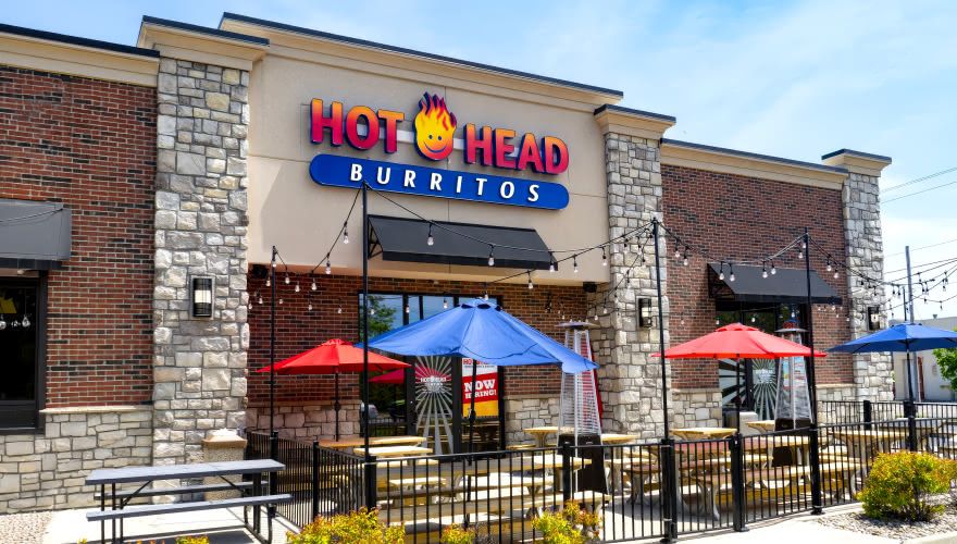 Hot Head Burritos restaurant exterior with branded storefront signage