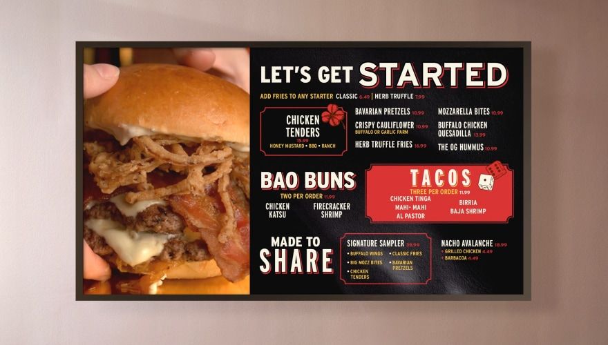 Lucky Strike digital menu board displaying food and drink promotions including burgers and tacos