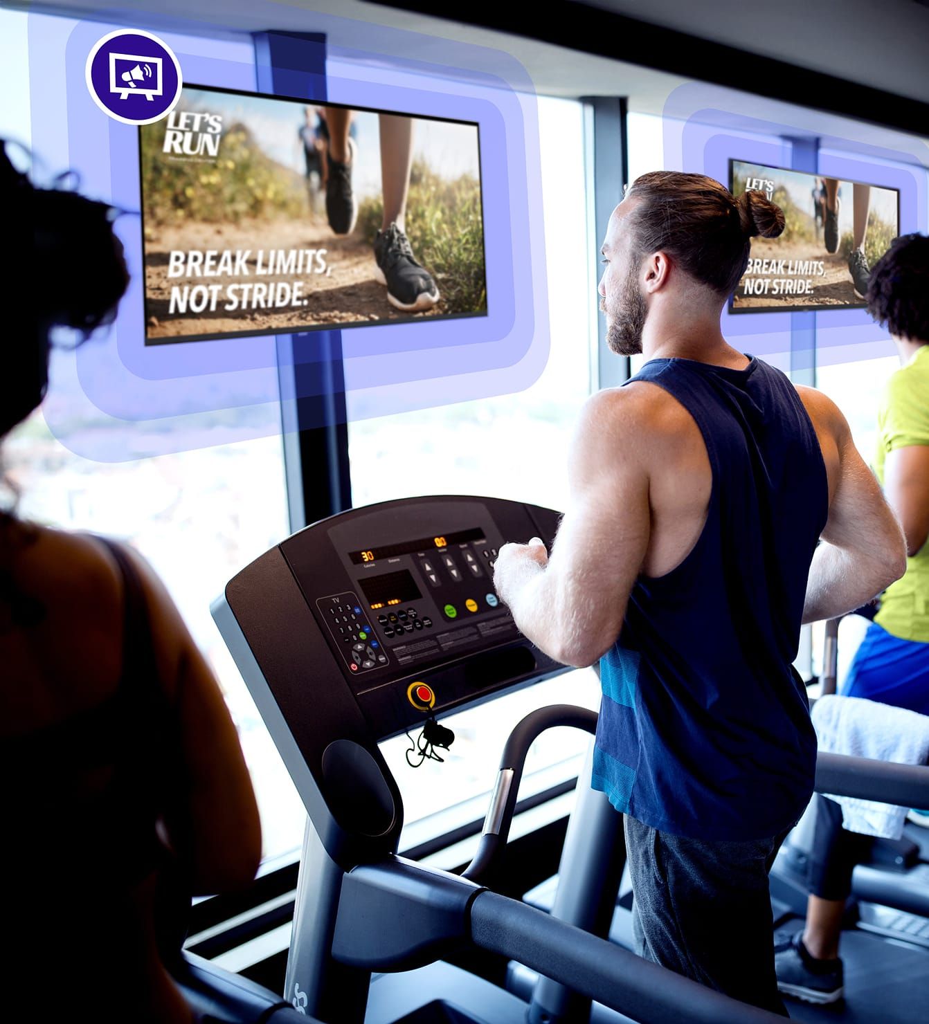 Gym-goers watching Rockbot TV on treadmills with motivational fitness content