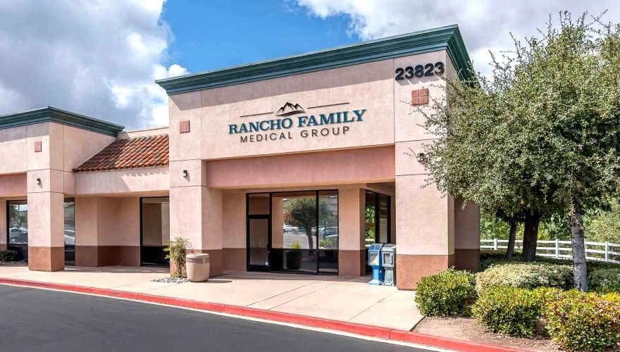 Rancho Family Medical Group clinic exterior with building signage